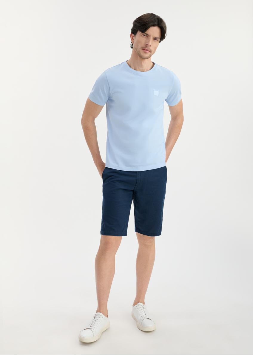 Light blue men's cotton T-shirt TSHMT-0100-60(W25), front view of the product on the model. The entire silhouette is visible.
