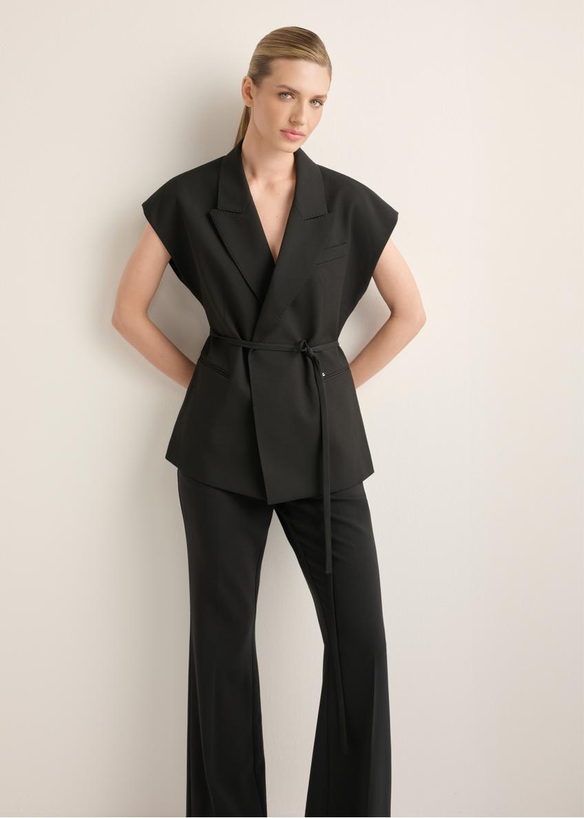 Women's black oversize suit vest KAMDT-0039-99(Z26), front view of the product on the model. Full body visible.