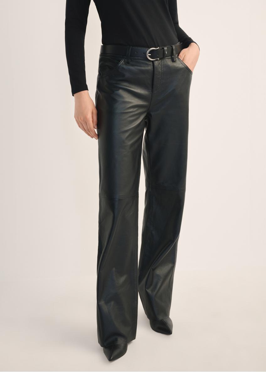 Women's black wide-leg leather trousers SPODS-0038-5339(Z25), front view of the product on the model. Half of the silhouette visible.