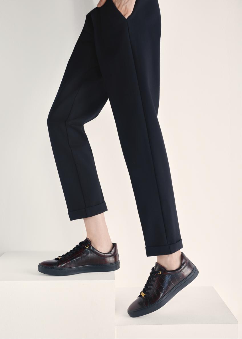 Women's leather shoes in burgundy color BUTYD-1188-09(Z25), view of the product on the model's feet against a light background.