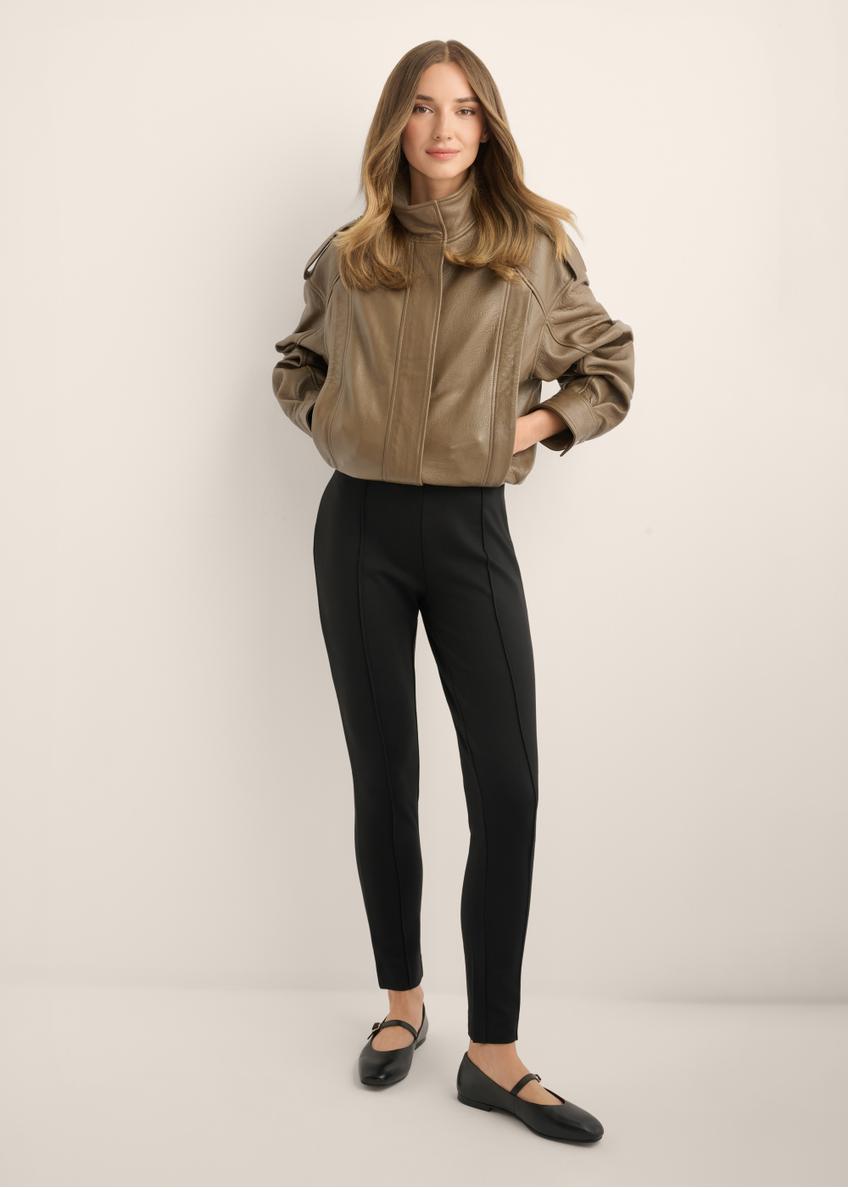 Black fitted women's trousers SPODT-0096-99(Z25), front view of the product on the model. Full body visible.