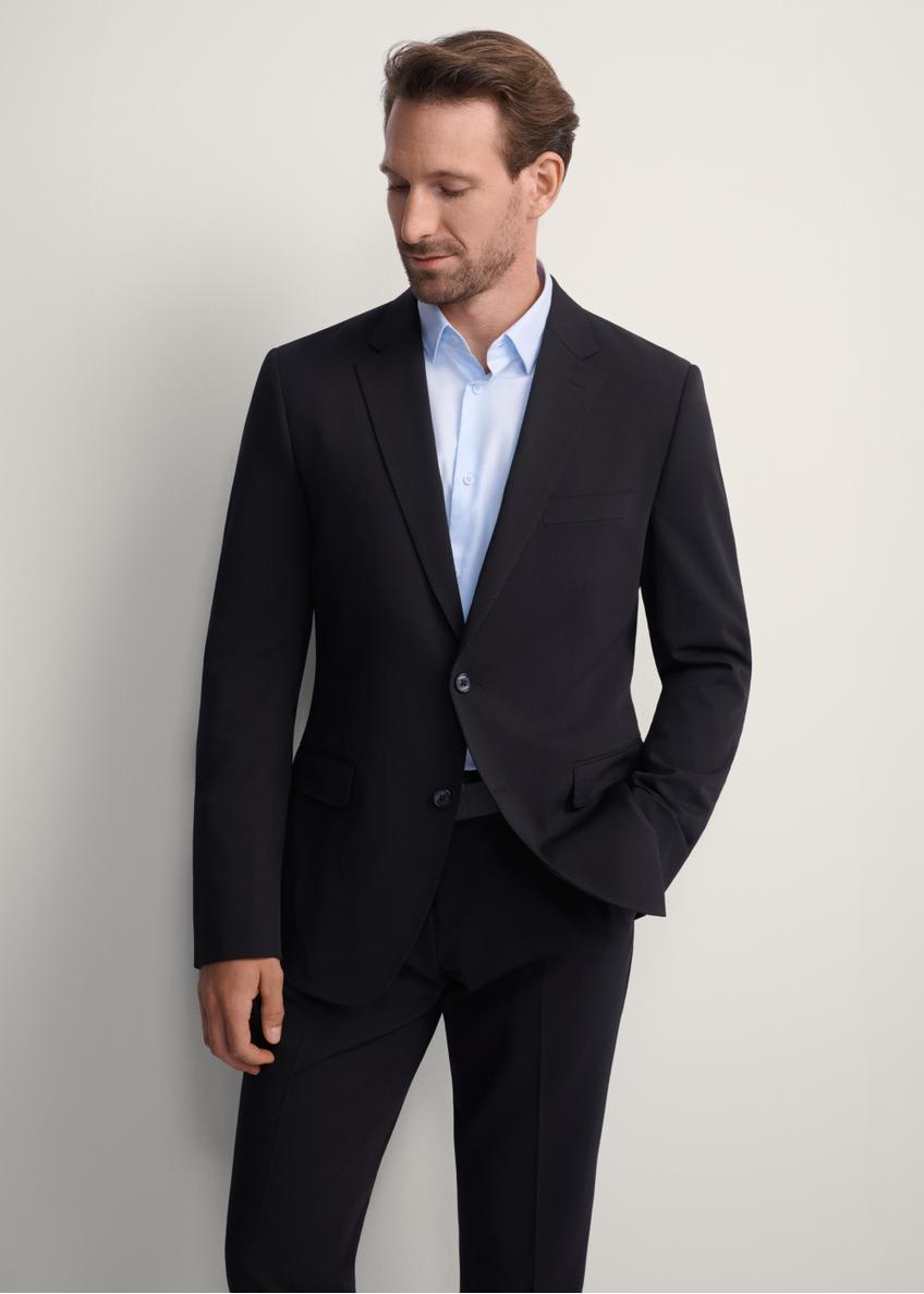 Black men's jacket MARMT-0019-99(Z25), front view of the product on the model, half of the silhouette visible.