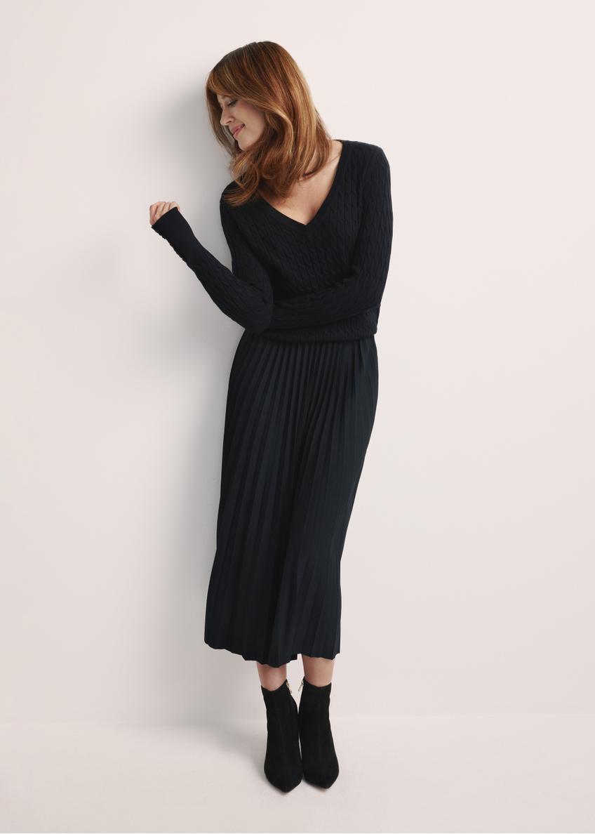 Black pleated women's dress SPCDT-0096-99(Z25), product visible from the front on the model, the entire silhouette is visible.