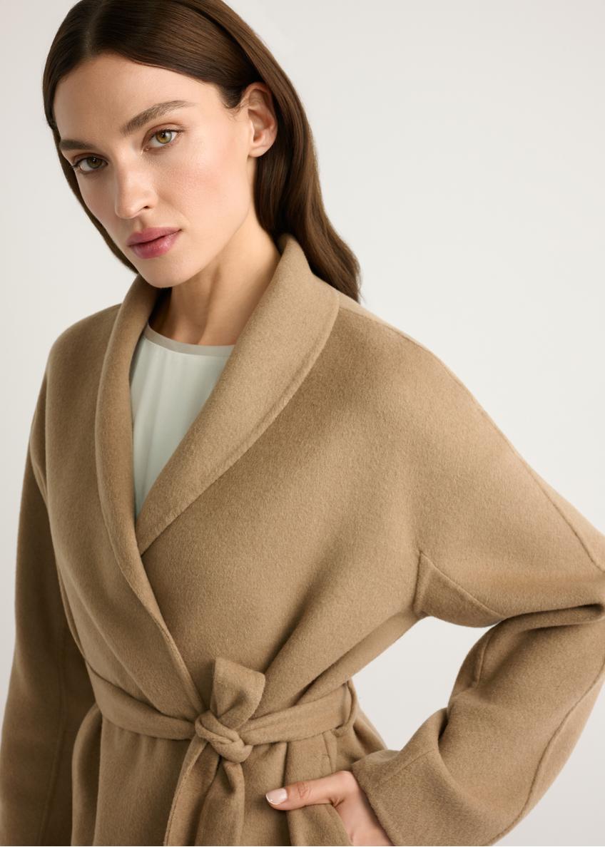 Women's camel wool coat PLADT-0074-1D(W26), close-up of the product on the model's silhouette.
