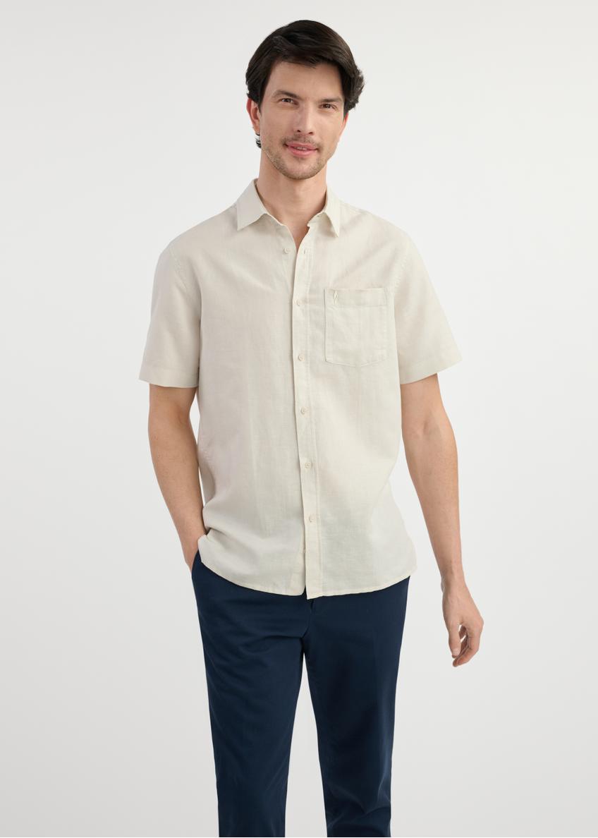 Beige men's shirt with short sleeves KOSMT-0327-81(W25) - front view on the model on a white background. Visible silhouette.
