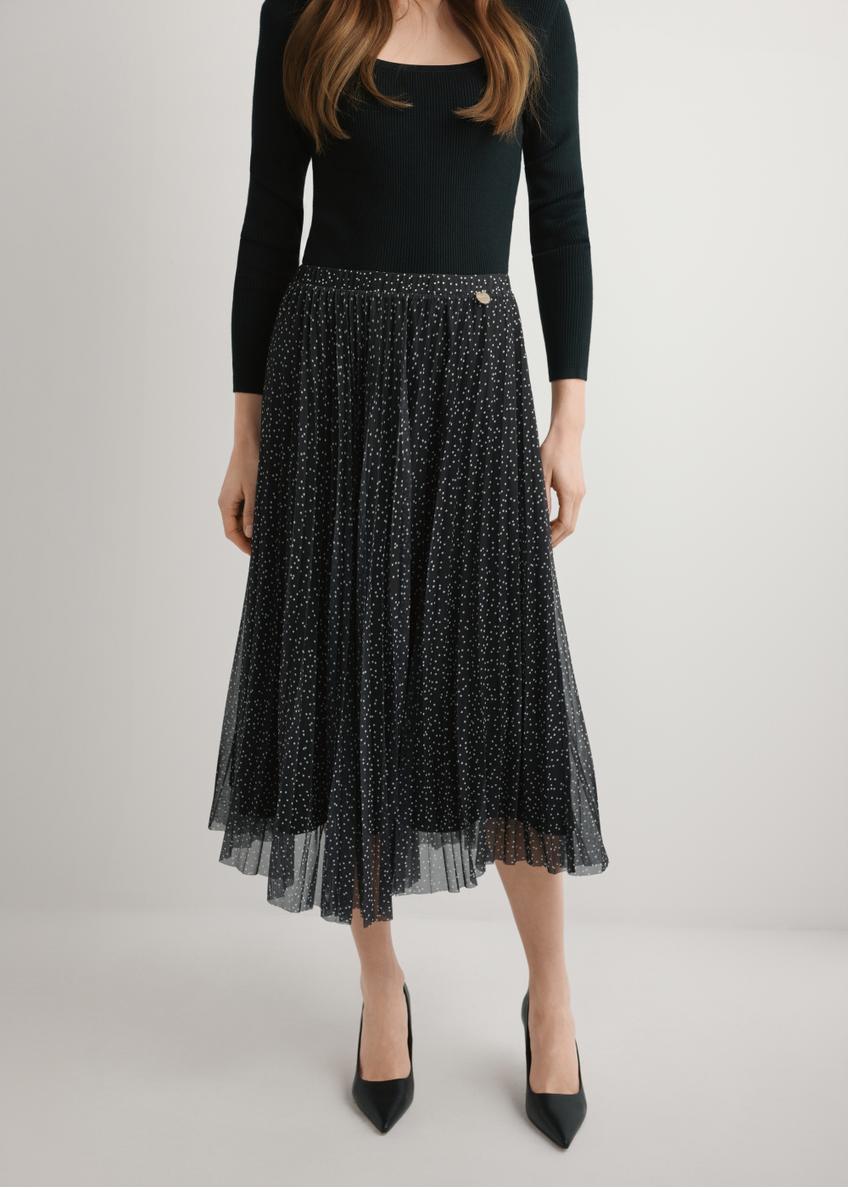 Polka dot pleated midi skirt SPCDT-0110-9P(W26), product view from the front on the model, half of the silhouette visible.