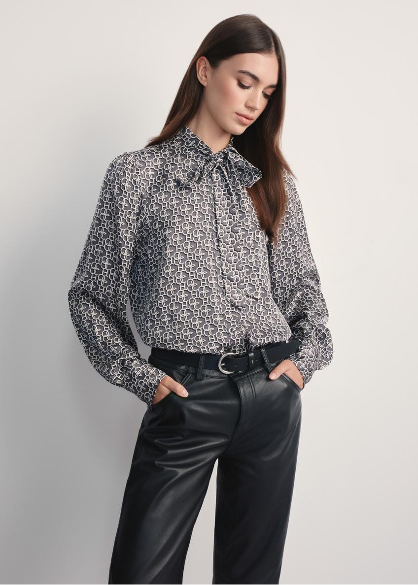 Women's shirt with monogram KOSDT-0175-96(Z25), front view of the product on a model, half of the silhouette visible.