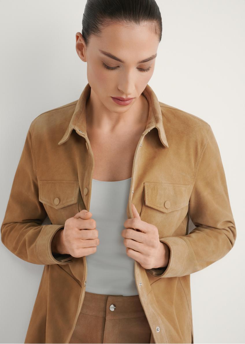 Women's beige leather shirt KOSDS-0006-1B(W26), front view of the product on the model. Half of the silhouette visible.