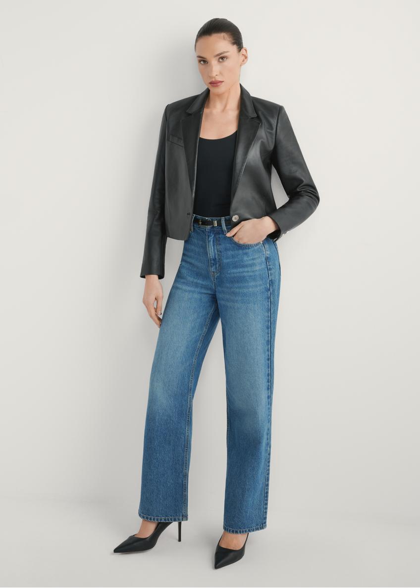 Women's short leather jacket KURDT-0522-99(W26) - front view of the product, on a model, against a light background. Full body visible.