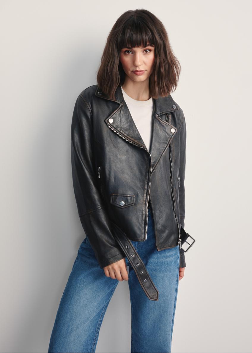 Dark brown women's leather jacket KURDS-0563-2729(Z25), front view of the product on the model. Half of the silhouette visible.