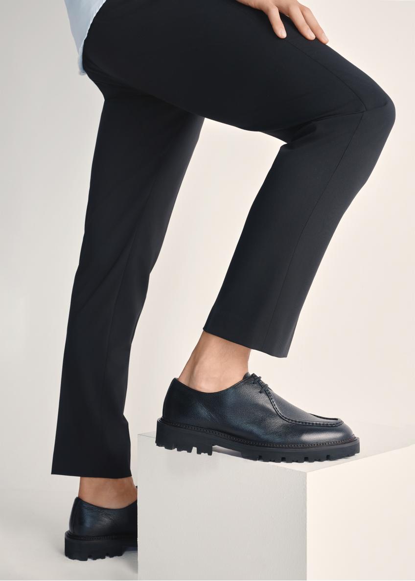 Black men's leather shoes BUTYM-0524-99(Z25), product view on model's feet against a light background.