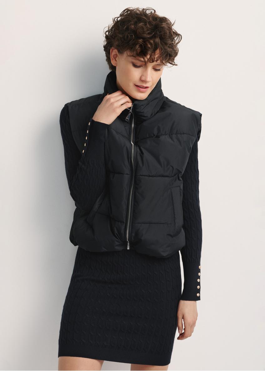 Black women's vest KAMDT-0033-99(Z25), front view of the product on the model. Half of the silhouette visible.