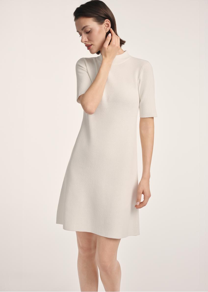 Cream women's dress SUKDT-0243-12(Z25), product visible from the front on the model, half of the silhouette visible.