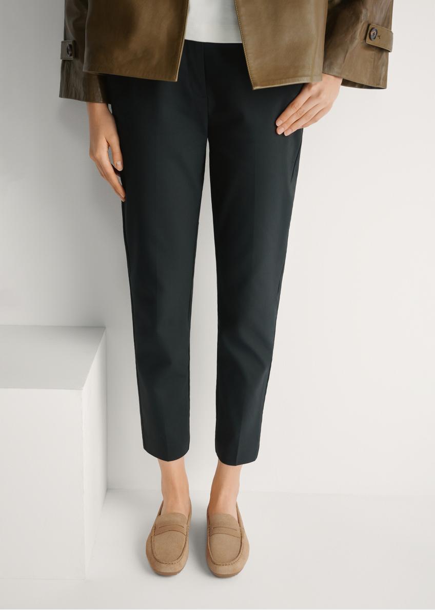 Women's beige leather moccasins BUTYD-1262-1B(W26), front view of the product on the model's feet.