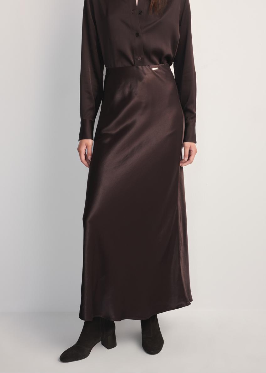 Chocolate long women's skirt SPCDT-0117-90(Z25), front view of the product on the model. Half of the silhouette visible.