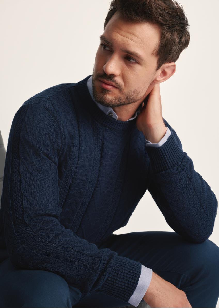 Navy blue men's sweater SWEMT-0179-68(Z25), close-up of the product detail on the model against a light background.