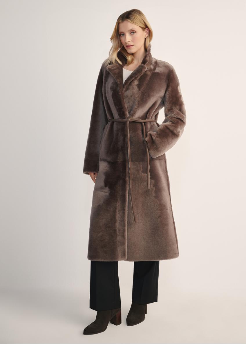 Women's long brown sheepskin coat KOZDS-0086- 3094(Z25) - front view of the product on a model, against a white background. Full body visible.