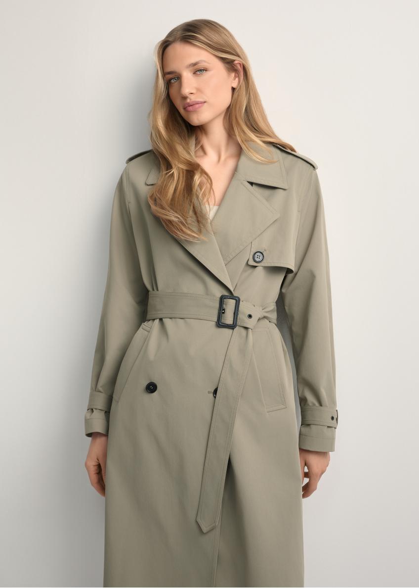 Long sage women's coat KURDT-0512-8F(W26), front view of the product on the model. Half of the silhouette visible.