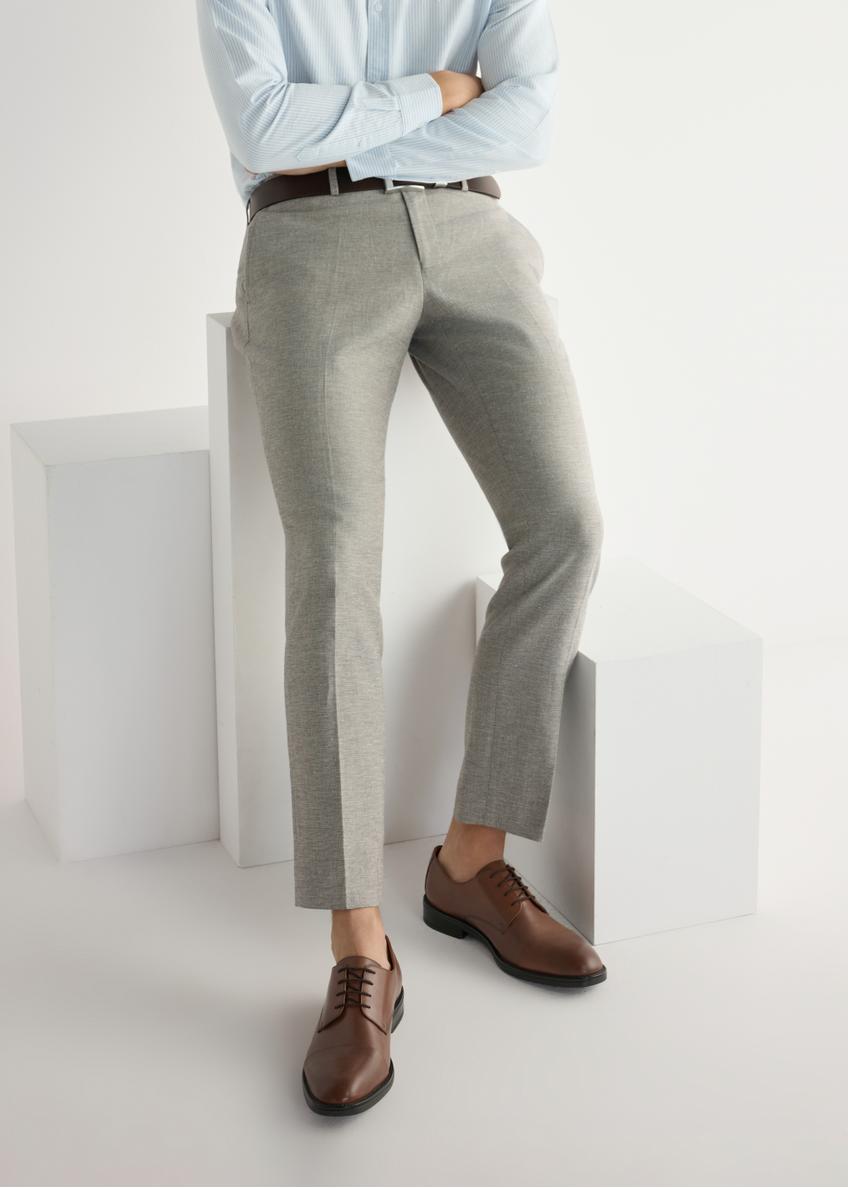 Men's leather brogues in cognac color BUTYM-0500-1F(W26), front view of the product on the model's feet.