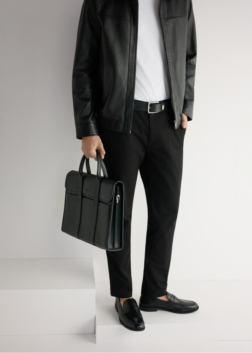 Men's black leather moccasins BUTYM-0538-99(W26), front view of the product on the model, half of the silhouette visible.