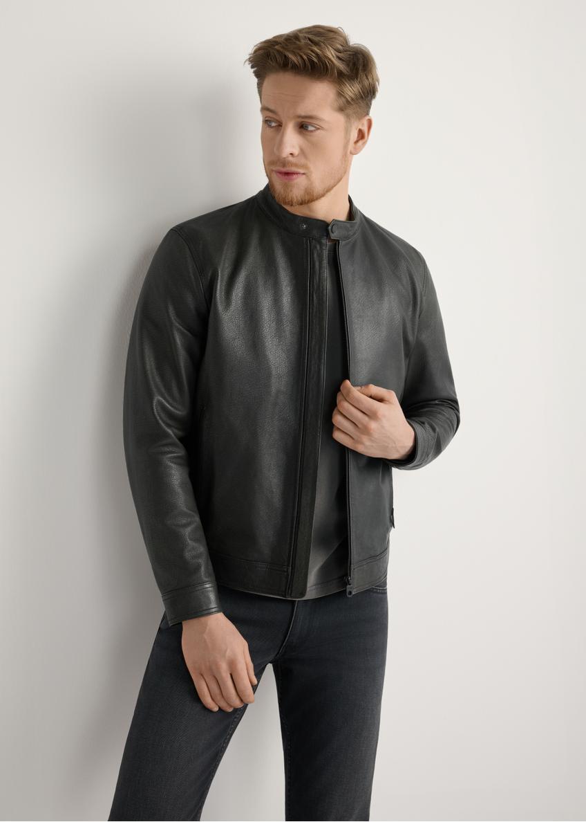 Black men's leather jacket KURMS-0406-99(W26) - front product view, on model, against a light background. Knee-length silhouette visible.