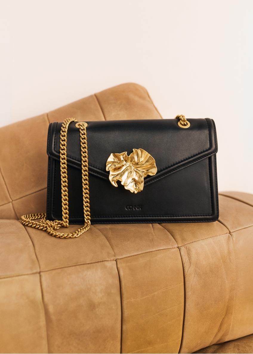 Black leather women's handbag with decorative element TORES-1394-99(Z26)