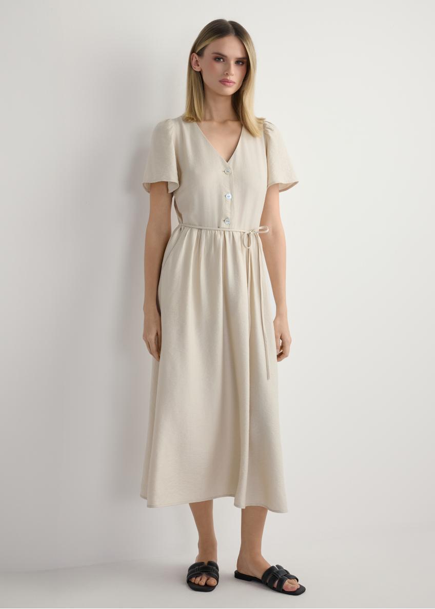 Women's light beige dress SUKDT-0255-1A(W26), front view of the product on the model. Full body visible.