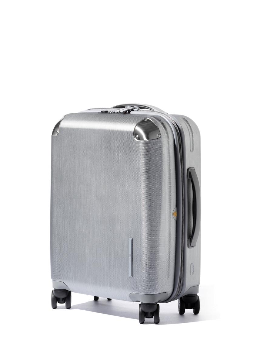Small suitcase on wheels WALPC-0001-9X-19(W26), diagonal product view on a white background.