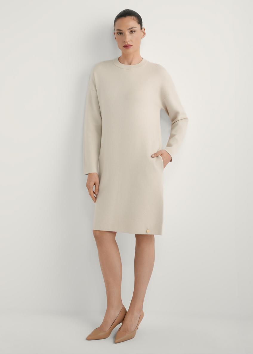 Beige women's dress SUKDT-0260-1A(W26), front view of the product on the model. Full body visible.