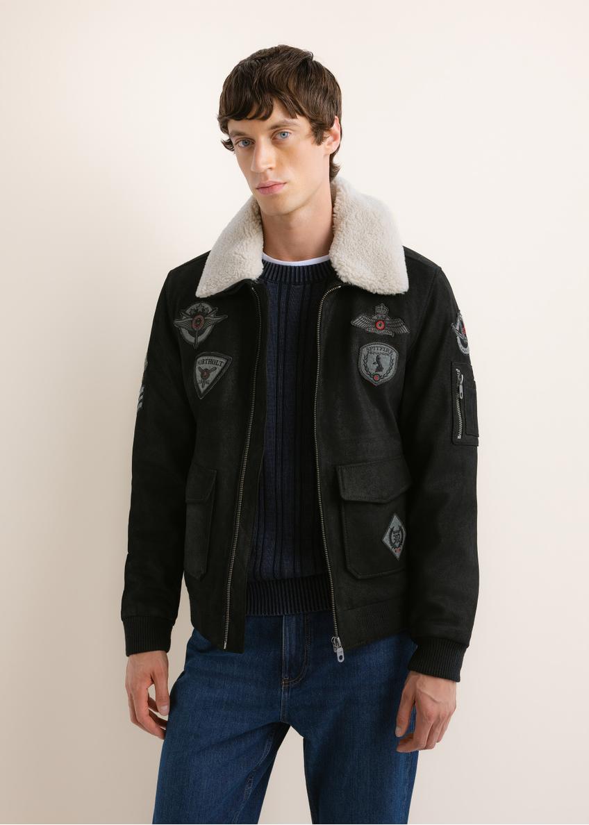 Black leather bomber jacket KURMS-0423-99(Z26), front view on a model. Half-body shot.