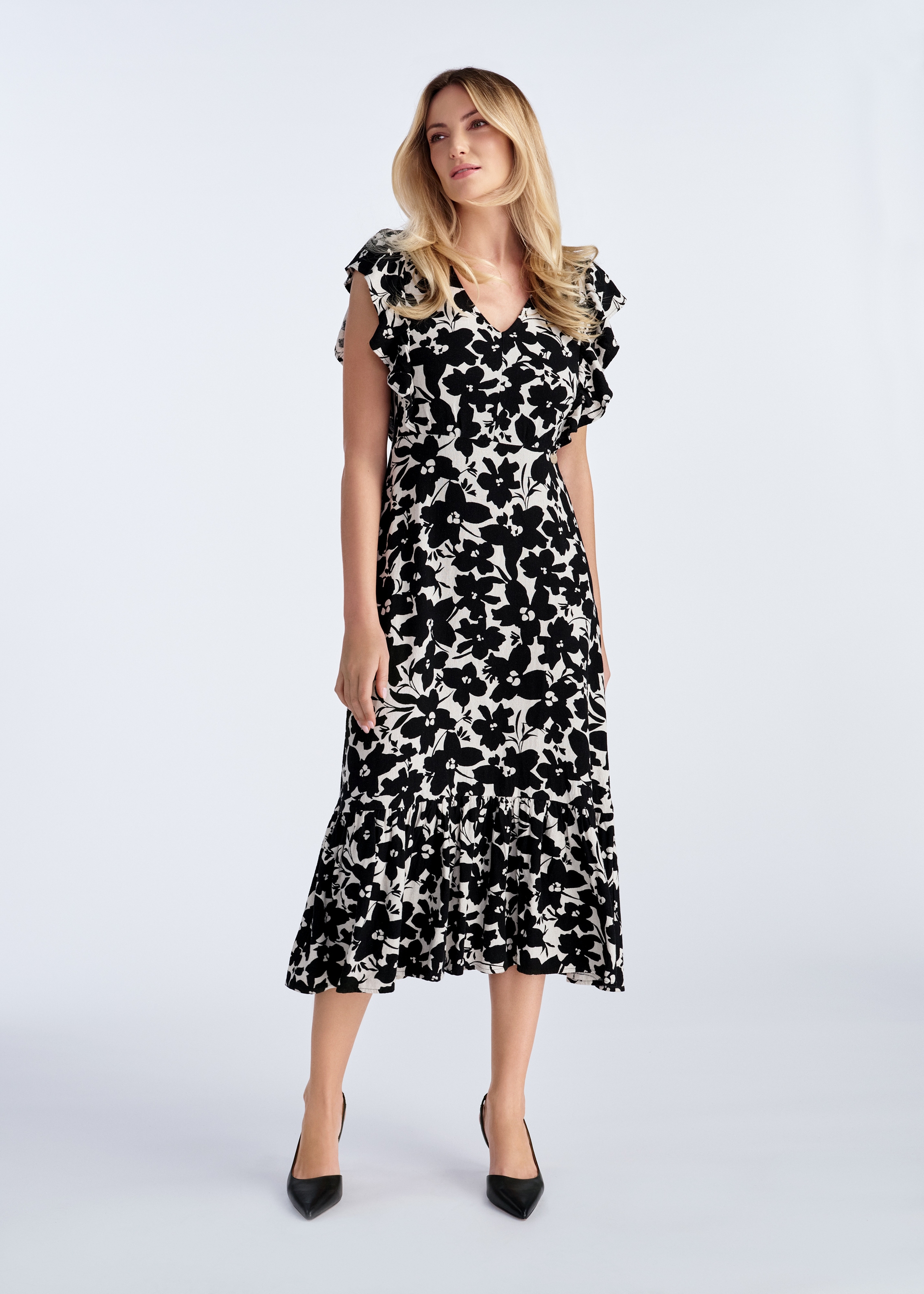 Women's dress with black flowers SUKDT-0220-81(W25)